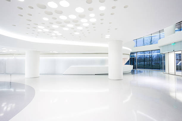 istock futuristic modern office building interior in urban city 529275185