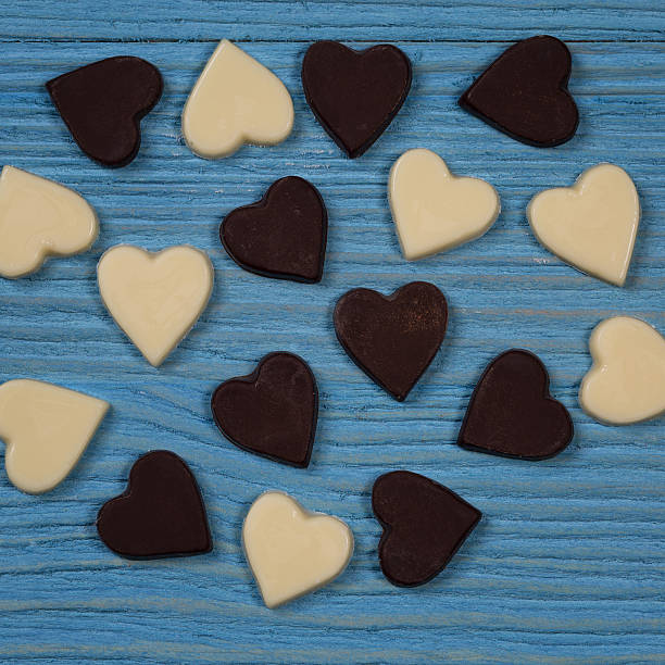 istock Chocolate hearts on a wooden background 529277549