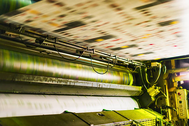 istock yellow colour cylinder in cmyk web offset printing press 529277831
