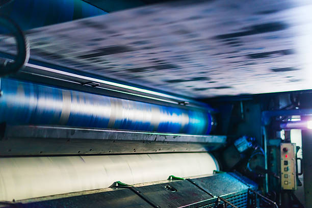 istock blue cyan colour cylinder in cmyk web offset printing press 529277847