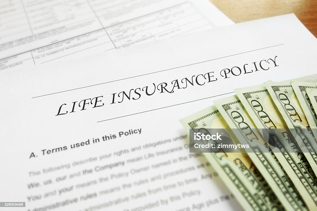 life insurance Life insurance policy and cash Life Insurance Stock Photo
