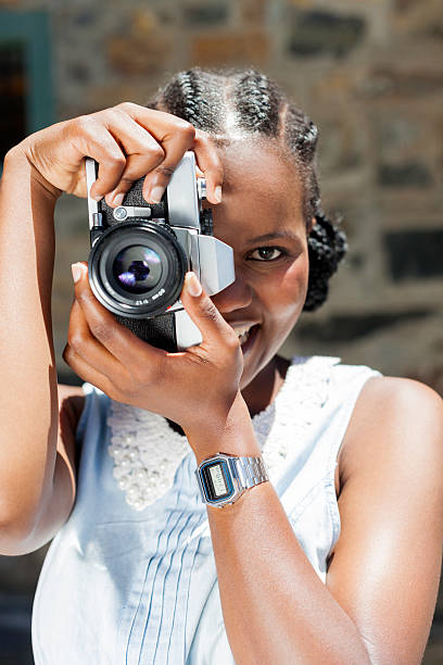 istock African female enjoying photography. 529313661