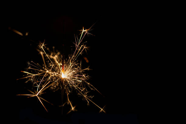 istock Christmas sparkler on black background 529314247
