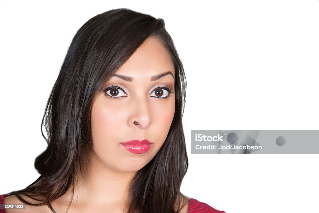 Beautiful young woman with a thoughtful expression Portrait of beautiful young hispanic woman. Taken with a Canon 5D Mark 3 camera.  rm 20-29 Years Stock Photo