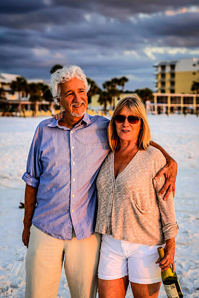 istock Active retirees enjoy the sunset on Siesta Key beach FL 529314629