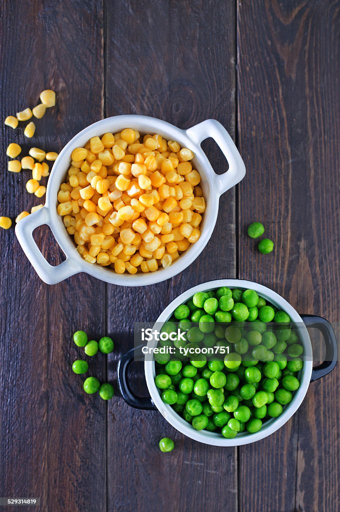 corn and peas sweet corn and green peas in bowl Corn Stock Photo