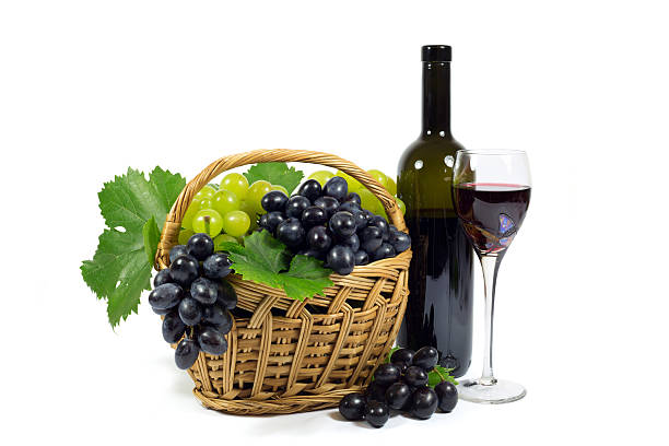 istock Grapes in Wicker Basket, Wine Glass Cup and Wine Bottle 529315367