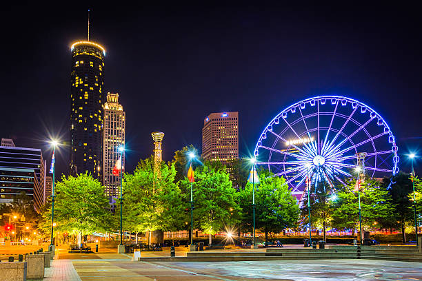 istock Ferris wheel and buildings seen from Olympic Centennial Park at 529315433