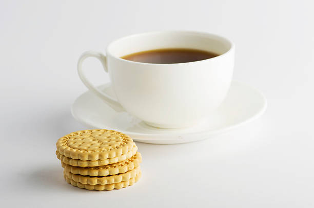 istock Cup of tea with cookies 529326531