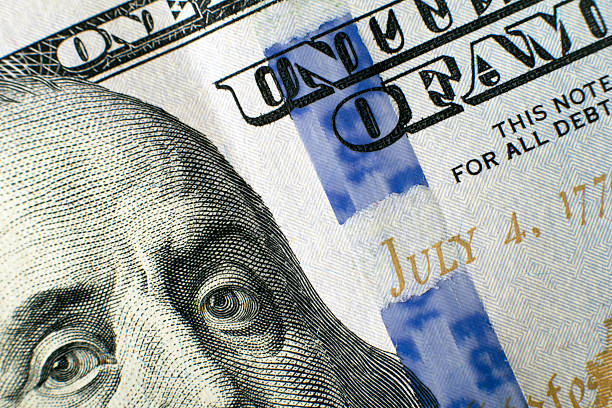 istock New 100 US dollar banknote detail. 2013 edition. 529326787