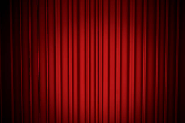 istock Theatre curtain in a spotlight 529328745