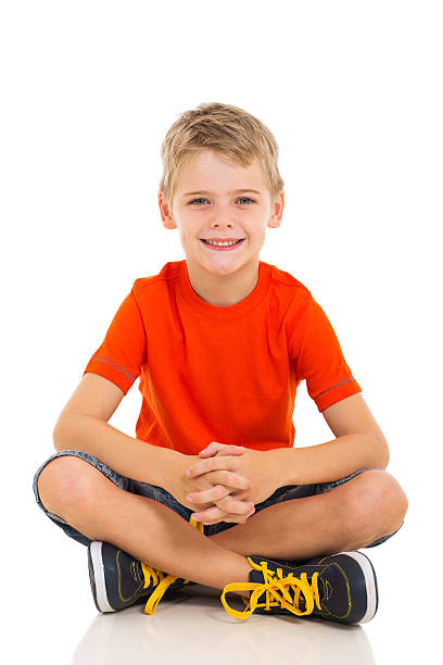 Small happy boy over white background