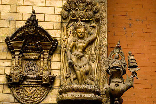 istock Bronze  Deity at wall in Nepal temple . 529351589