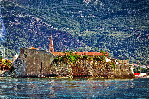 Old photo with touristic island Saint Stephen. Montenegro, Europa.