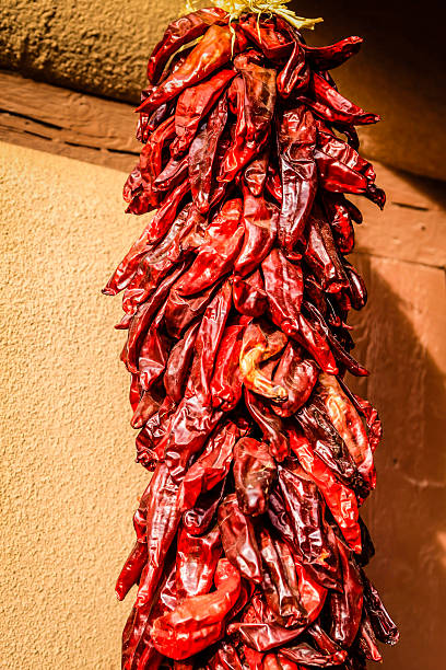 istock Red Chilli Ristra outside a house in Santa Fe NM 529356815