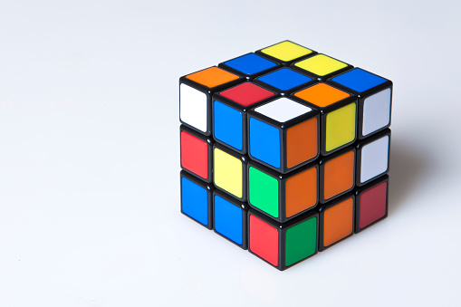 Turku, Finland - December 18, 2014: Rubik's Cube invented by a Hungarian architect Erno Rubik in 1974 is famous is 3 dimensional puzzle originally called Magic Cube.