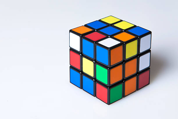 unsolved Rubik's cube Turku, Finland - December 18, 2014: Rubik's Cube invented by a Hungarian architect Erno Rubik in 1974 is famous is 3 dimensional puzzle originally called Magic Cube. magic trick photos stock pictures, royalty-free photos & images