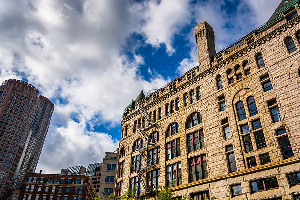 istock Beautiful sky over buildings in Boston, Massachusetts. 529357219