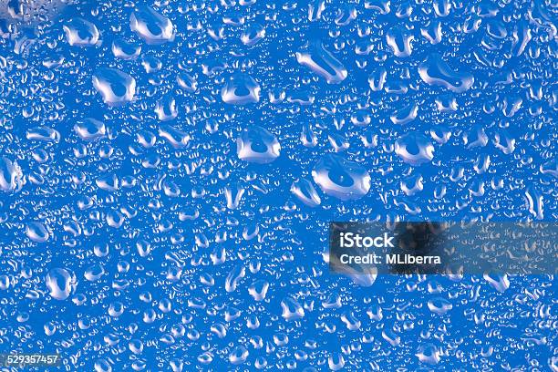 Water Drops Blue Background Stock Photo - Download Image Now - Abstract, Backgrounds, Blue