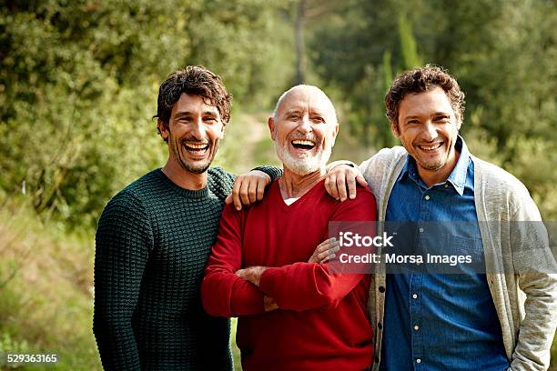 Happy Family At Park Stock Photo - Download Image Now - Only Men, Family, Father