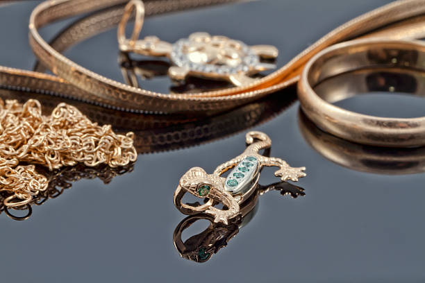 istock Unusual gold pendant in the form of lizard 529368089