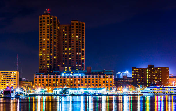 istock Waterfront buildings at night in the Inner Harbor, Baltimore, Ma 529368145