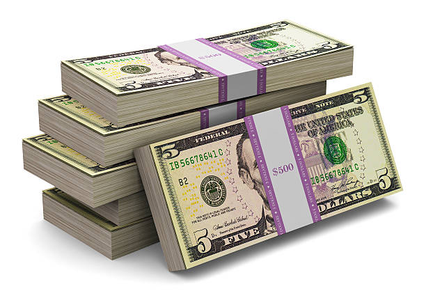 istock Stacks of 5 dollars banknotes 529369257