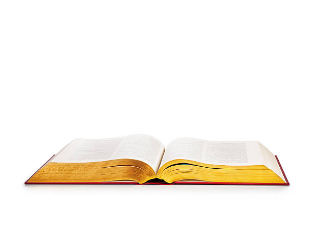 Open book Open book with gold pages isolated on white background. Religion themes. Object with clipping path bible art library stock pictures, royalty-free photos & images