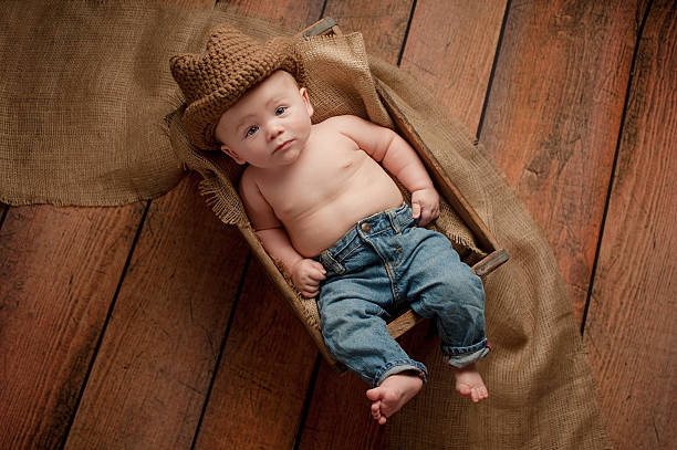 Baby Boy Wearing a Cowboy Hat stock photo