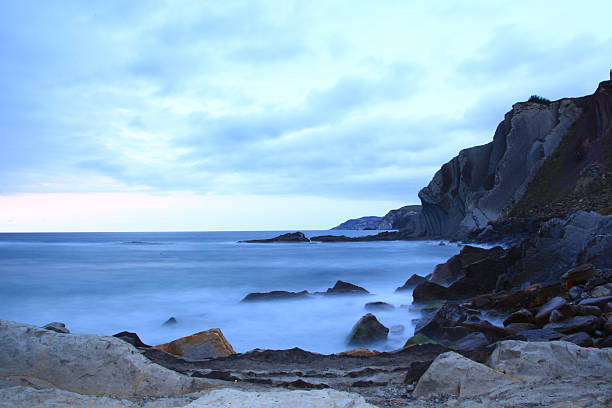 A sunset on the cliffs of the beach of Vizcaya.