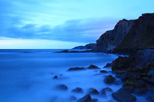 Cliffs of the Basque coast bodies of water hit the coast hard in Biscay sopelana stock pictures, royalty-free photos & images