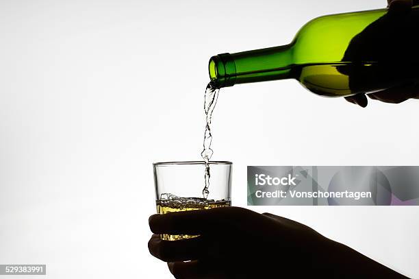 Female Hand Pouring Wine Into Glass Stock Photo - Download Image Now - Abuse, Addiction, Adult