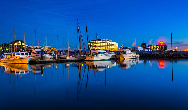 istock Twilight reflections in a marina in Harbor East, Baltimore, Mary 529385505