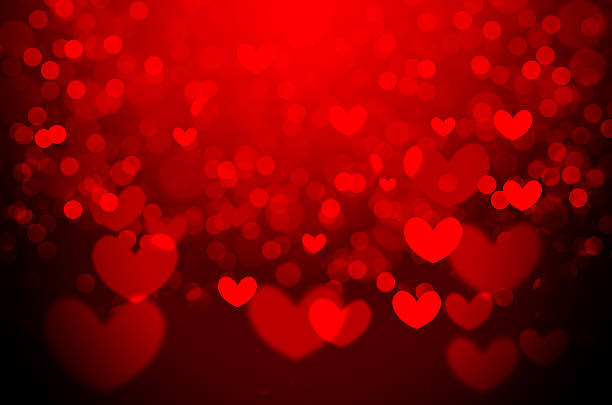 istock Red heart Christmas bokeh background 529385665