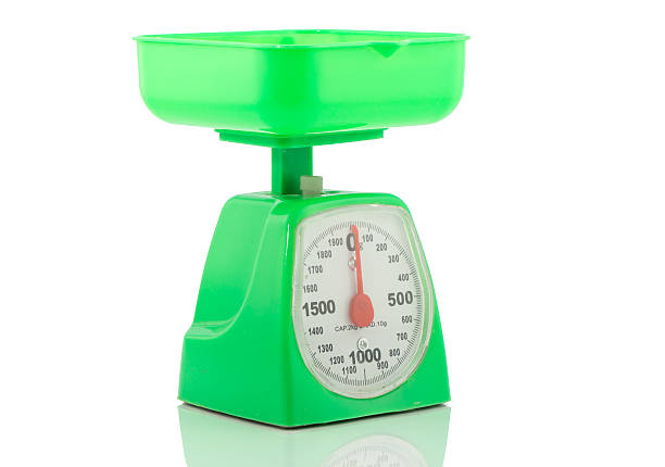 istock Green kitchen weighing scale for food ingredients 529387345
