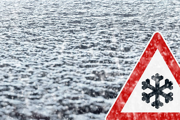 istock Winter Driving - Winter Road - Caution Snow 529387447