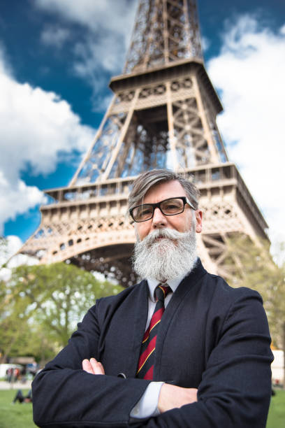Senior hipster business man portrait under the tour eiffel