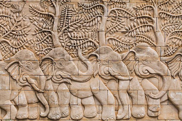 Low relief cement Thai style handcraft of elephant