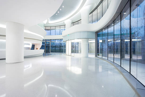 istock futuristic modern office building interior in urban city 529405959