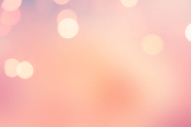 istock Abstract background with purple colors and bokeh lights 529406475