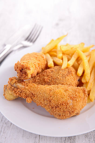 istock crispy fried chicken and french fries 529407098