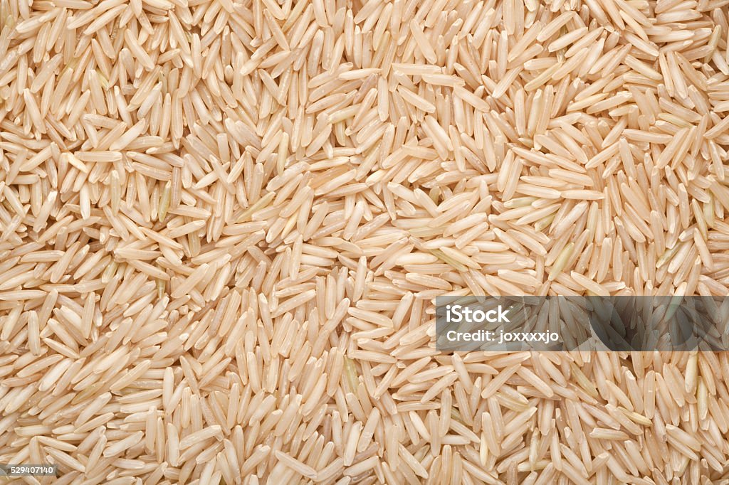 Brown basmati rice Closeup of a lot of brown basmati rice Abundance Stock Photo