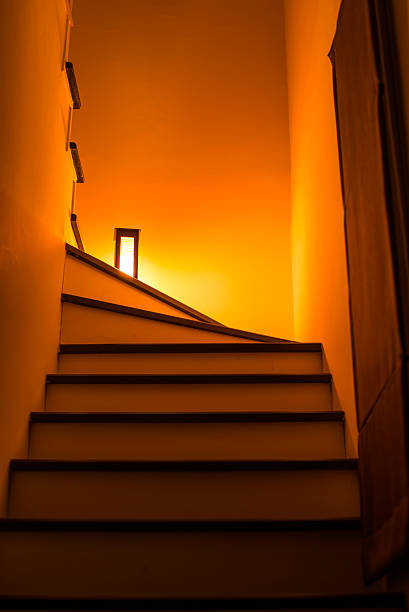 istock Lights illuminating the stairway at night 529407172