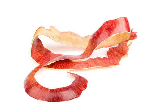 isolé pomme peel long - pelure pomme photos et images de collection