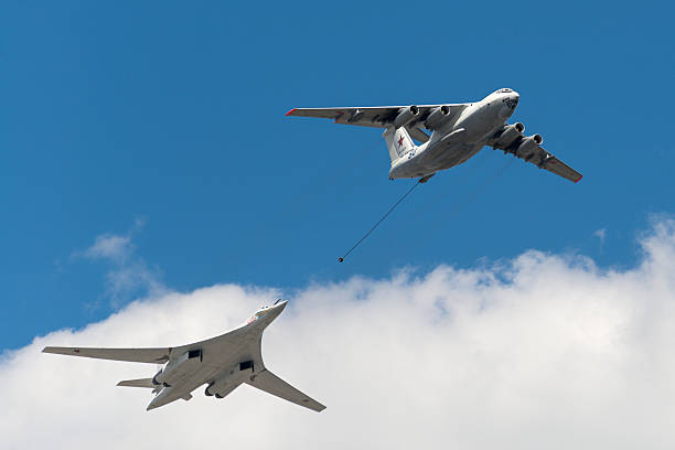 Simulation of in-flight refueling aircraft Il-78 and Tu-160 Moscow, Russia - May 07, 2016: Simulation of in-flight refueling aircraft Il-78 and Tu-160 during flying over Red Square. Dress rehearsal of the Victory Day parade on Red Square. tu160 stock pictures, royalty-free photos & images