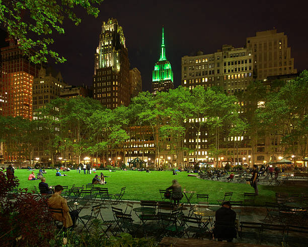 Bryant Park Lawn Open Night with Empire State in Green stock photo