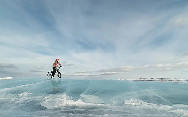 Photo of Girl on a bmx on ice.