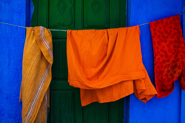 Additive colors on the facade of this small house in Jodhpur, India. Traditional architecture of the city with blue paint on the walls