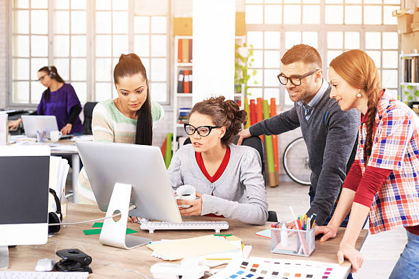 istock Team designers discussing ideas at the office 529414092