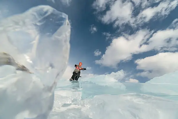 Photo of Girl on a bmx on ice.